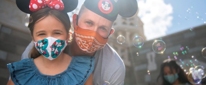 Family Father at Disneyland with daughter