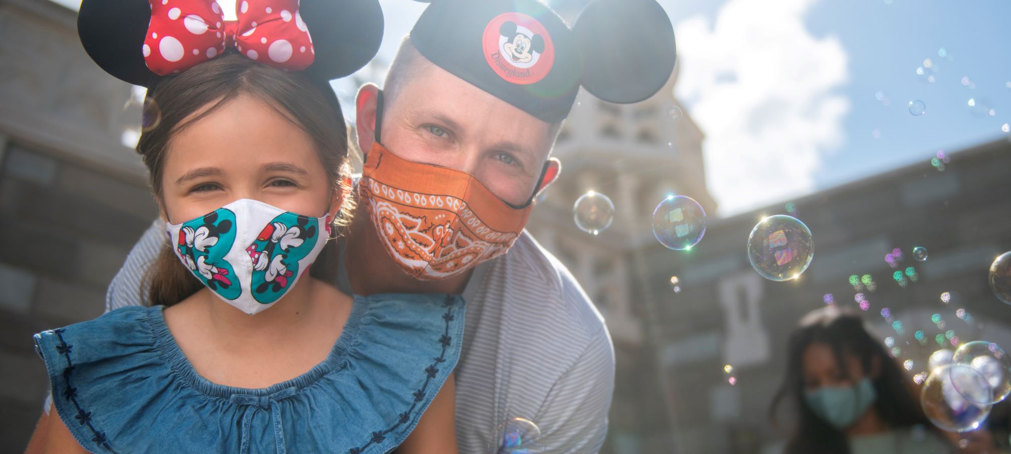 Family Father at Disneyland with daughter